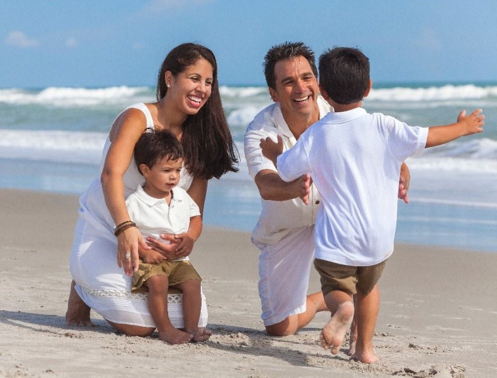 family laughing on vacation