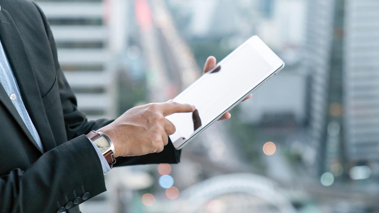 businessman using digital tablet