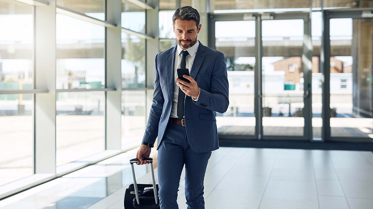 guy in airport waiting for call