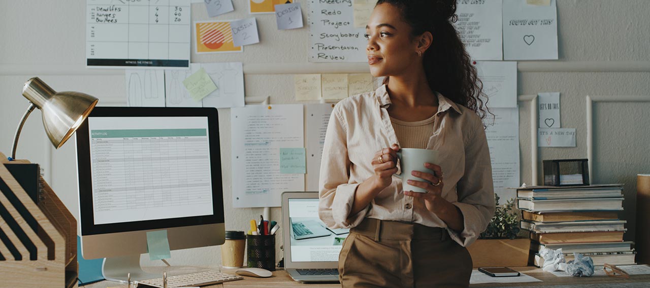 young businesswoman holding coffee