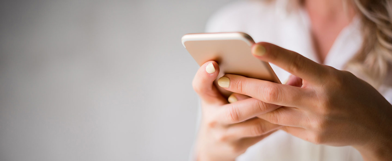 woman holding a phone